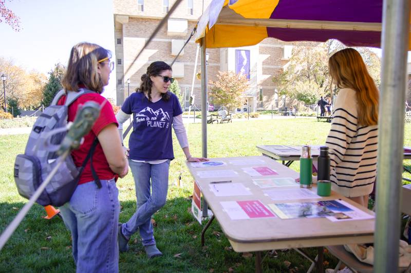 Three people talking outside at the Fall 2024 Sustainability Showcase