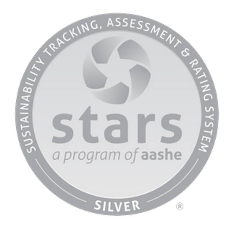 silver coin that says 'stars a program of aashe' surrounded by sustainability tracking rating and assessment system and then 'silver'