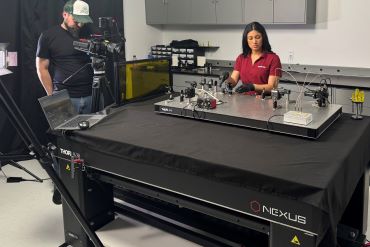 student creating education video at thorlabs