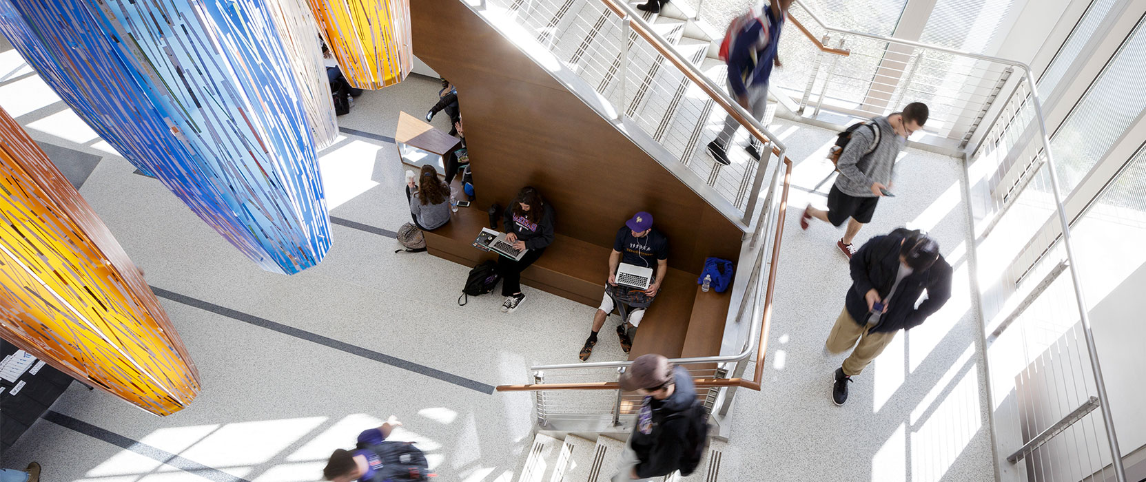 Arial shot of students walking through the CBPM building