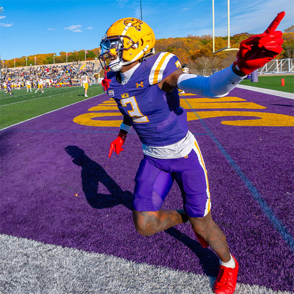Football player running onto field
