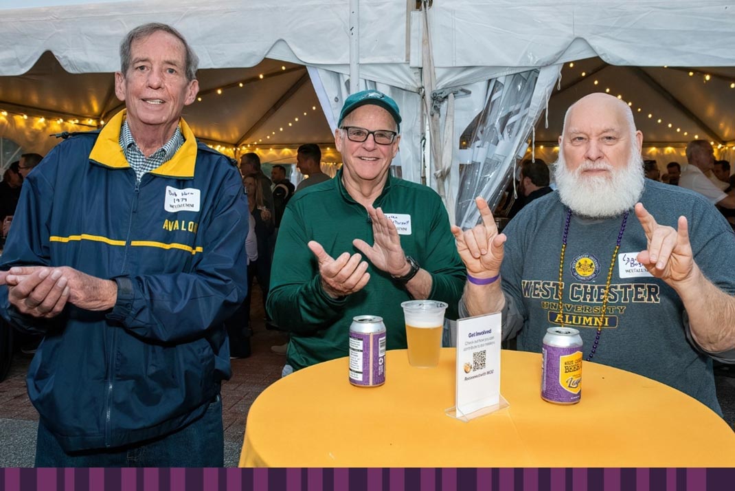 3 mens in wcu fan gear enjoying refreshments