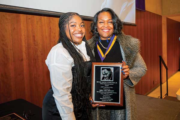 Lisa Wright Bryant ’87 (R) with student emcee Kyanna Randolph