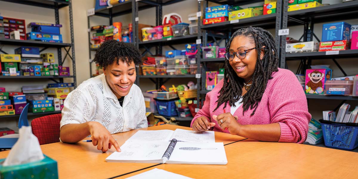 WCU graduate assistants often work one-on-one with faculty, like Dr. Reva Zimmerman (right) and her graduate assistant, Kimorah Gonzalez, a firstyear student in the speech language pathology master’s program.