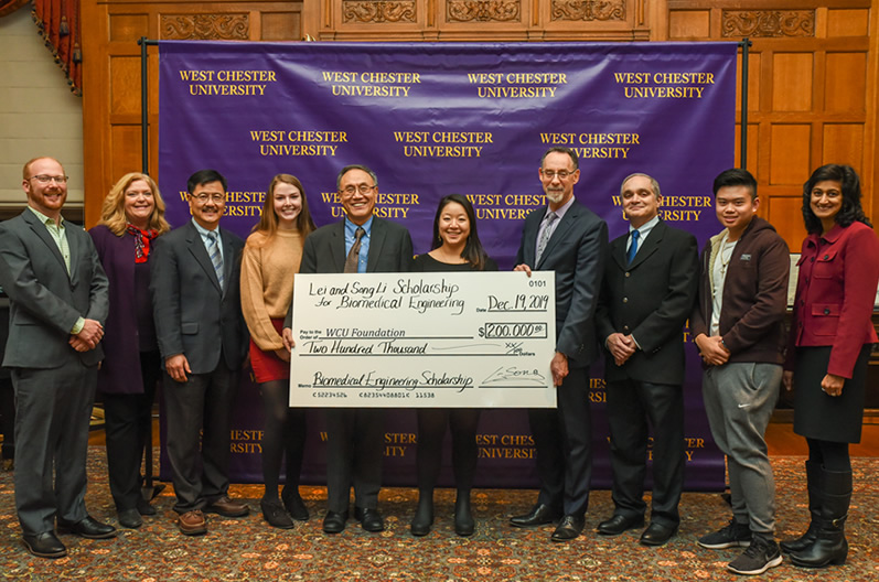 Pictured at the check presentation at West Chester University are (left to right) Dr. Jesse Placone, faculty, biomedical engineering; Helen Hammerschmidt, West Chester University Foundation, director of corporate and foundation relations; Dr. Zhongping Huang, department chair, biomedical engineering; Anna Carroll, WCU student, biomedical engineering; Dr. Song Li, CEO, Frontage Laboratories, Inc.; Wendy Li, Dr. Li’s daughter and a doctoral student at University of Wisconsin; West Chester University President Christopher Fiorentino; Dr. Tony Nicastro, department chair, physics; JC Atienza, WCU student, biomedical engineering; Dr. Radha Pyati, dean, West Chester University College of the Sciences and Mathematics.