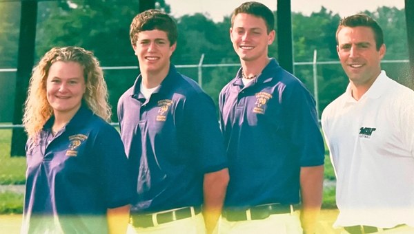 Kansas City Chiefs Assistant Athletic Trainer, Julie Frymyer pictured during her junior year at West Chester University as an intern in the Athletic Training Program working with the University’s intercollegiate football team. Julie also worked with the team as an intern during her senior year at West Chester University. Pictured (l to r) in the 2003 photo are Frymyer (’05 graduate), Joshua Minori (’05 graduate), Brett Phelan (’04 graduate), and Scott Heinerichs, now dean of West Chester University’s College of Health Sciences and professor of athletic training.  Photo taken August 2003.