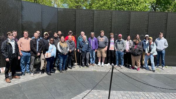 Professor of History Bob Kodosky (pictured in the center wearing a purple jacket) and WCU students who conducted the oral history interviews along with several local veterans from VVA 436 and the Marine Corps. League who participated in the project.