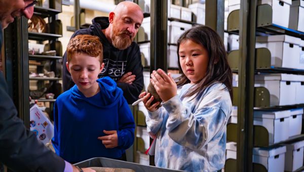 Students from a local FIRST® LEGO® League team interact with artifacts at the WCU museum. 