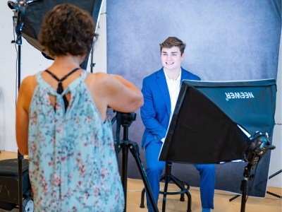 student getting their professional headshot photo taken at the career fair