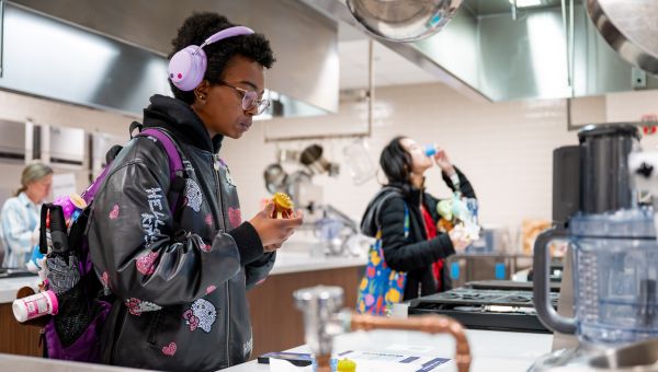 Students sampling pistachio quick bread at the College of Health Sciences third annual Food and Sensory Evaluation Competition through the Department of Nutrition