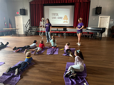 Students taking stretching classes