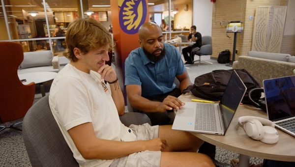 Student getting help at One Stop