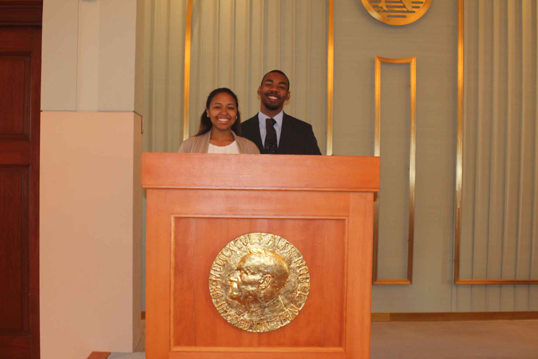 Two people at a podium 1