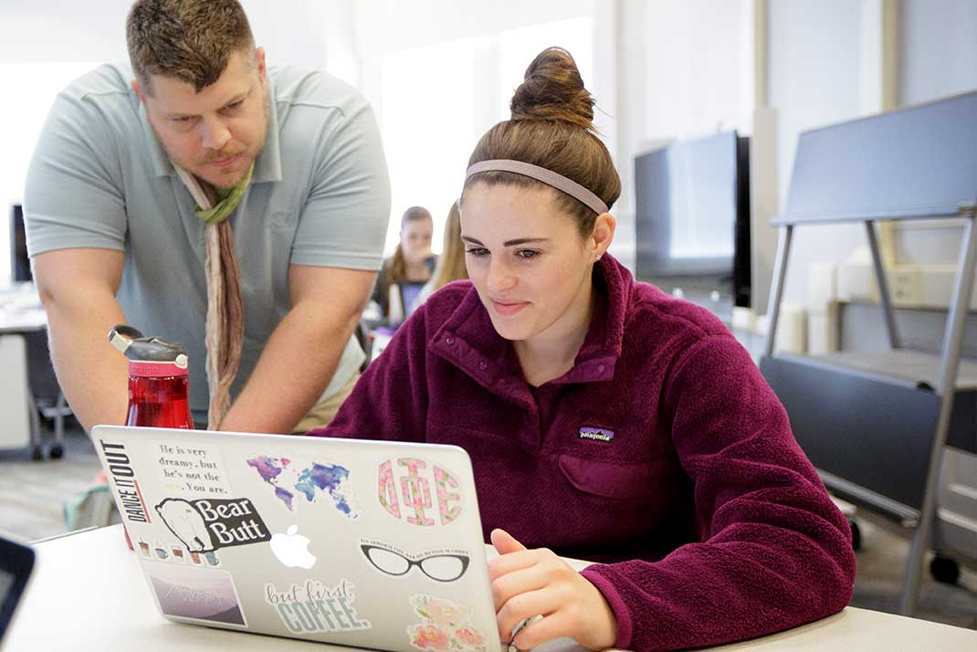 female Student with teacher