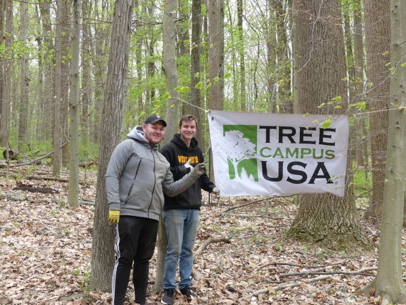 Members of the Friar's Society who participated in the tree planting event