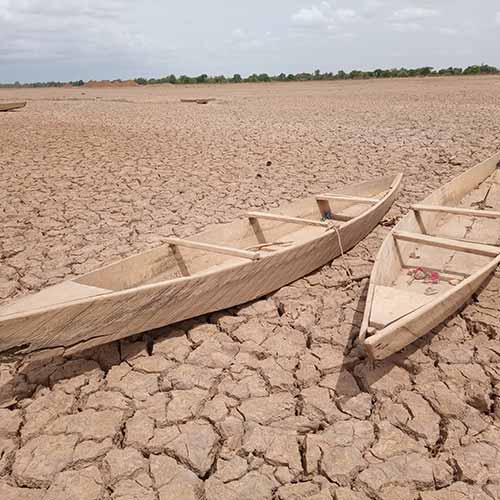 Boats in dry desert