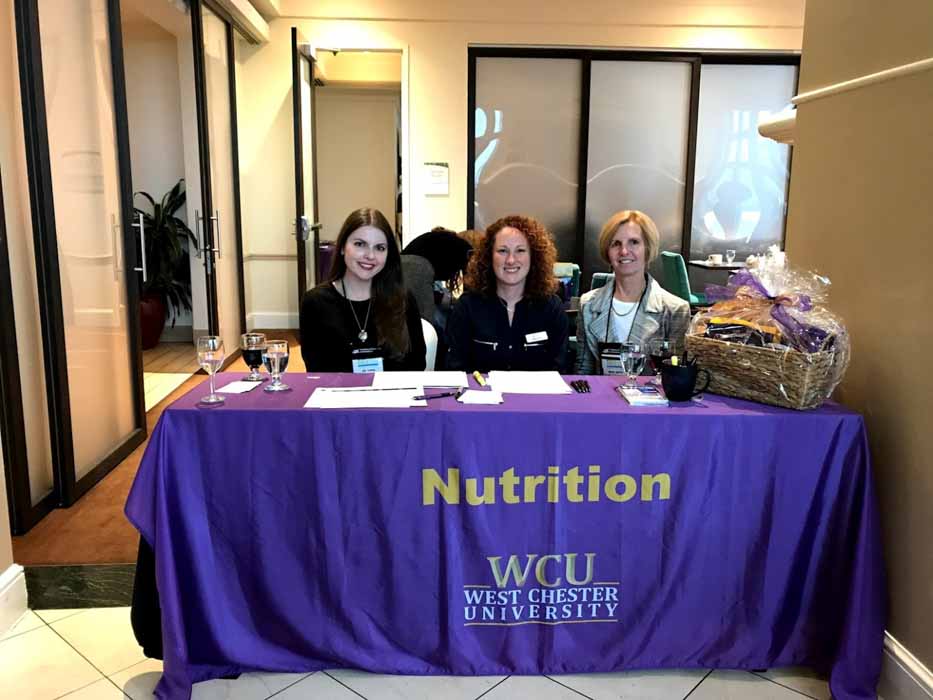 nutrition booth with faculty at fnce