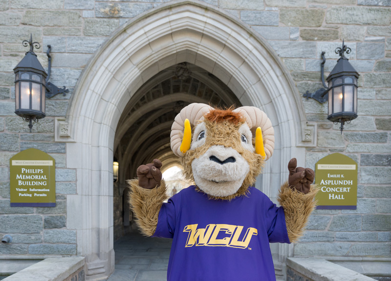 WCU Mascot Rammy in front of Phillips Hall