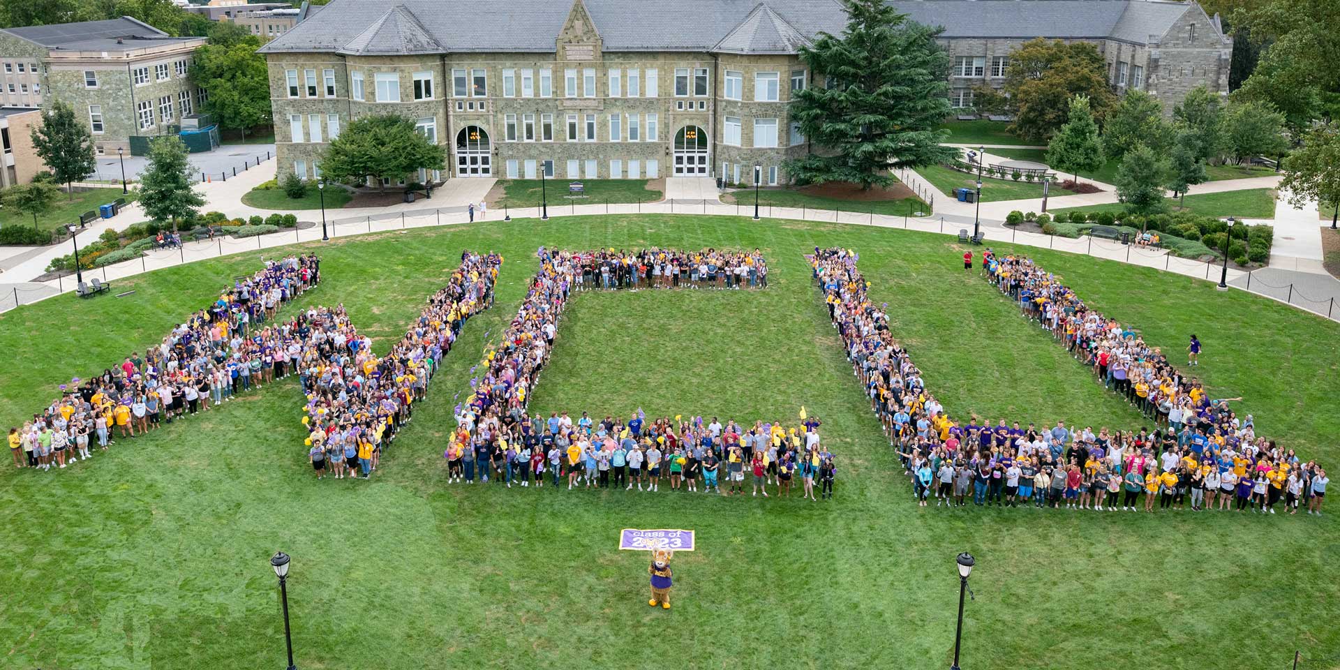 'WCU' spelled out by students in the quad