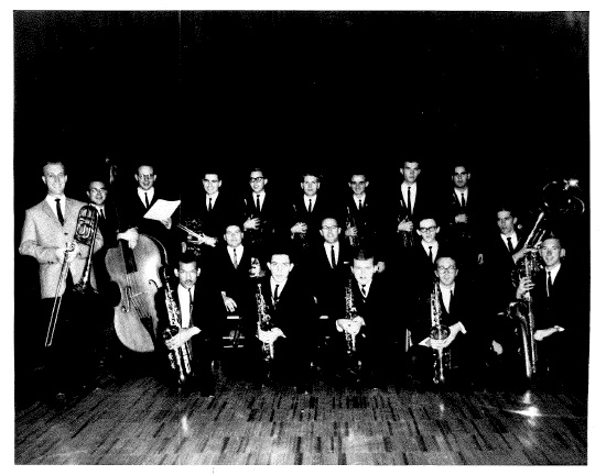 Black and white photo of Loe Southall with music Students
