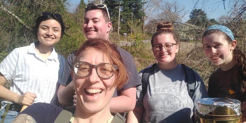 WCU Biology students Janelle Pedroza, Matt Fuchs, Barbara Bowen, and Miranda Davies collect stream sediment, water, and macroinvertebrates with Dr. Fork at Plum Run in West Chester.