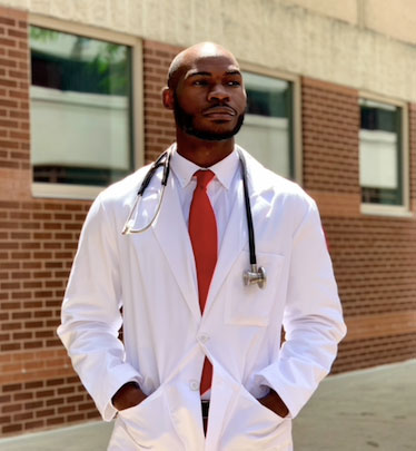 Demetrius Woodard White Coat