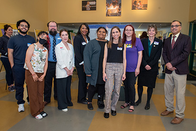 From left to right: Noah Aldabishi, Melissa Ceren, and Steven Holochwost (CUNY's Lehman College) stand with Blanca Velazquez-Martin (WCU Psychology Master's Program Alum), Tarrell Davis (Executive Director of Early Childhood at Settlement Music School), Shanelle Stovall (WCU PsyD Student), Ellie Brown (WCU Professor of Psychology), Estefania Ortiz (WCU Psychology BS Alum), Amanda Bryans (Federal Office of Head Start Education and Research to Practice Supervisor), and Sunil Iyengar (National Endowment for the Arts Director of Research and Analysis)